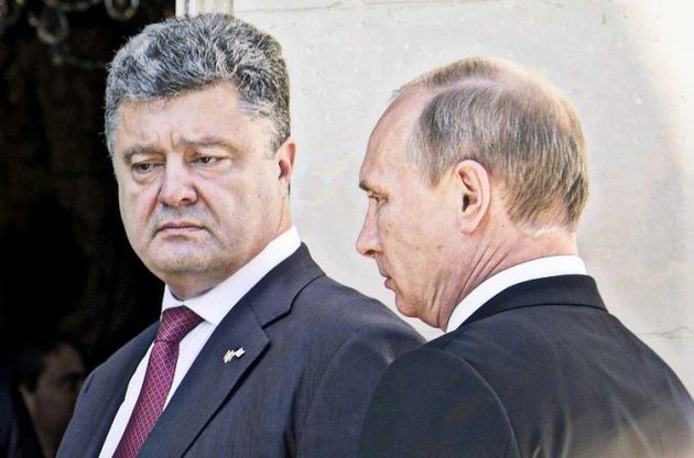 Порошенко и Путин обсудили возможное прекращения огня