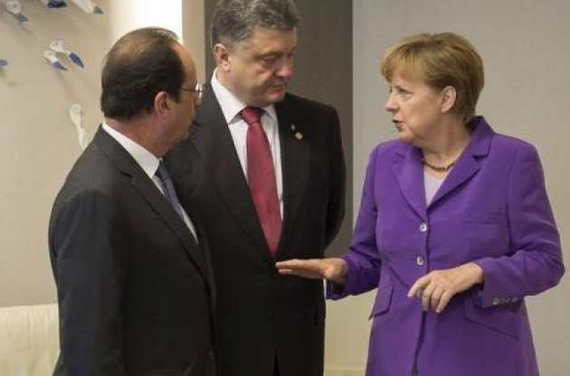 Порошенко, Меркель и Олланд обсудили прекращение огня в Донбассе и освобождение заложников