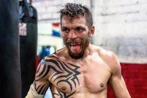 Дисквалификация украинского боксера Редкача за укус соперника сокращена вдвое