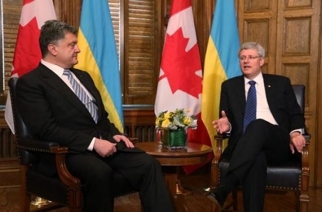 Порошенко возобновляет переговоры по зоне свободной торговли с Канадой