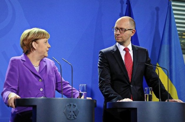 Меркель накануне визита Яценюка: Германия будет инвестировать в Украину после борьбы с коррупцией