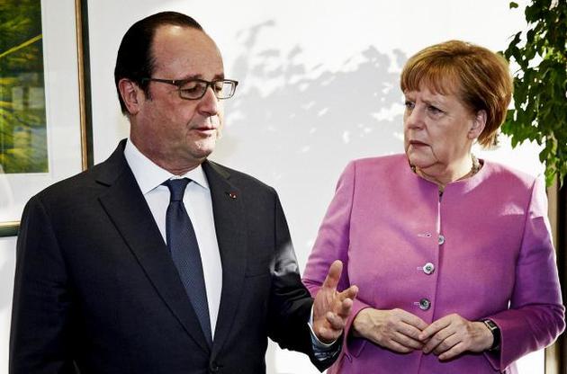 Меркель і Олланд не відвідають економічний форум у Давосі