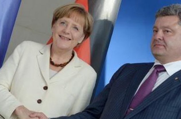 Меркель похвалила Порошенко за створення буферної зони на Донбасі