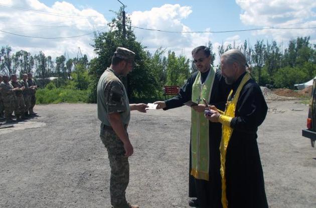Украинские военные получили церковные награды от патриарха Филарета