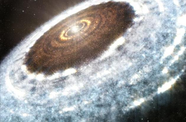Астрономы увидели "линию снега" возле молодой звезды