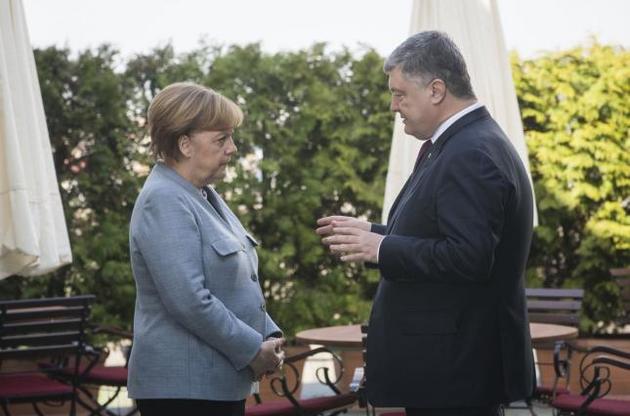 Меркель пообещала сделать все для восстановления территориальной целостности Украины