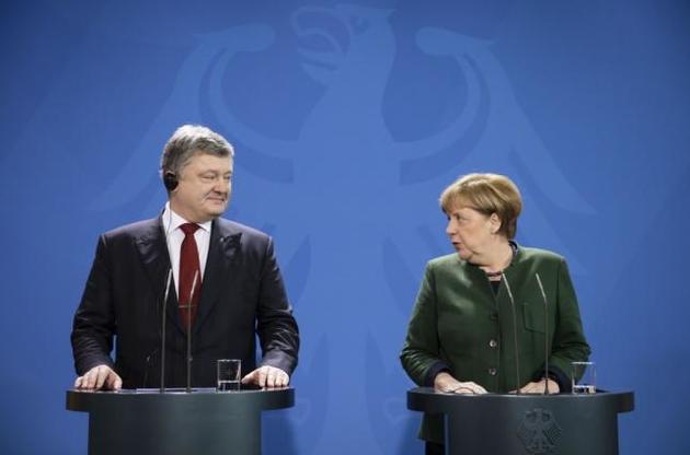 Меркель розповіла Порошенко про свої домовленості з Путіним у Сочі