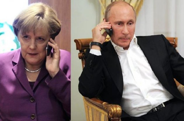Меркель по телефону поговорила с Путиным об Украине накануне встречи с Порошенко