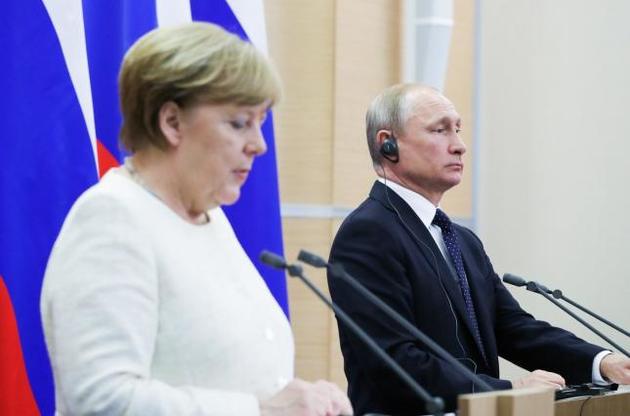 Меркель пообіцяла Путіну обговорити з Порошенком арешт Вишинського