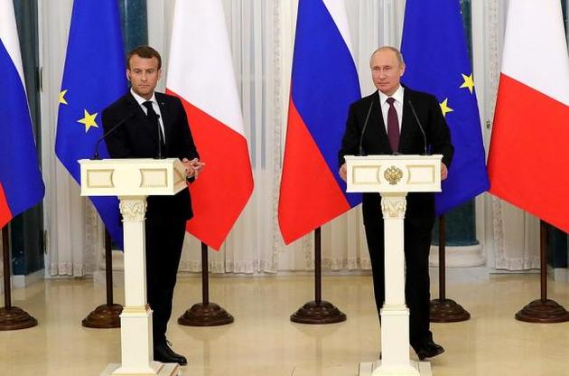 Макрон и Путин прокомментировали срыв переговоров лидеров США и КНДР