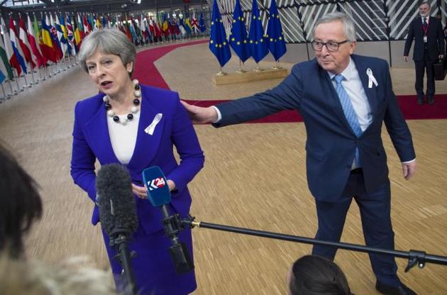 Премьер-министр Великобритании Тереза Мэй и Председатель Европейской комиссии Жан-Клод Юнкер