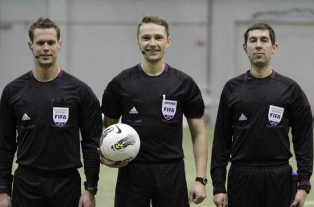 Андрис Трейманис (по центру)