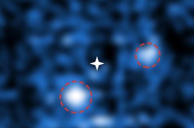 Астрономам удалось увидеть две новорожденных планеты у далекой звезды