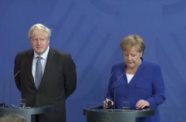 Джонсон и Меркель указали на отсутствие предпосылок для возвращения России в G8