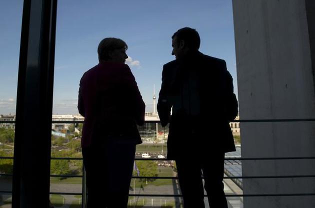 Испытание Меркель и Макроном