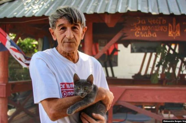 При обыске у Олега Приходько забрали два флага