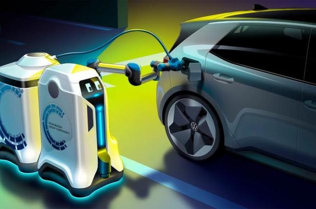 Робот может зарядить электрокар прямо на парковке