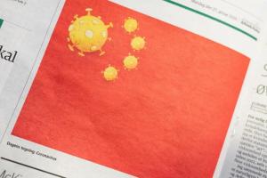 Китай вимагає вибачень від датської газети за карикатуру на коронавірус