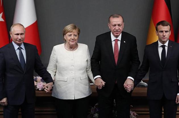 Меркель и Макрон призвали Путина и Эрдогана разрядить кризис в Сирии