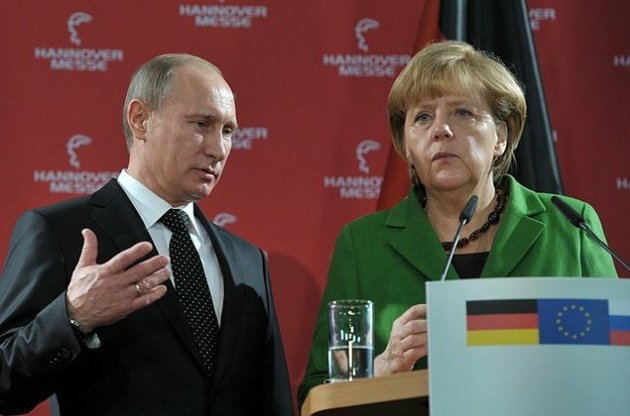 Путін на зустрічі з Ангелою Меркель