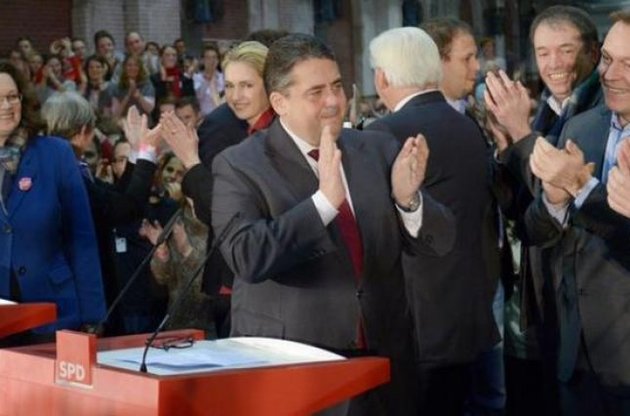 Cоциал-демократы проголосовали за &quot;большую коалицию&quot; в Германии