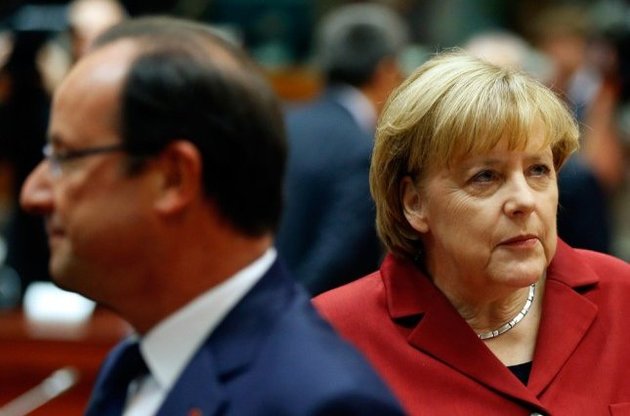 Меркель і Олланд пригрозили Путіну новими санкціями