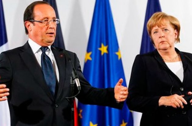 Меркель и Олланд пригрозили России новыми санкциями