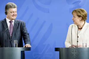 Меркель розповіла Порошенко про "рішучі" дії ЄС і привітала переговори з сепаратистами