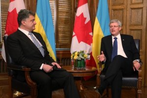 Порошенко возобновляет переговоры по зоне свободной торговли с Канадой