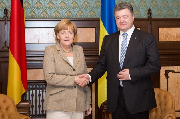Порошенко и Меркель договорились о встрече в Париже