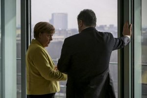 Меркель похвалила Порошенка за "сміливість" запропонувати частині Донбасу "особливий статус"