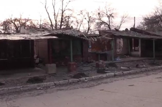 Поврежденный дом в Попасной