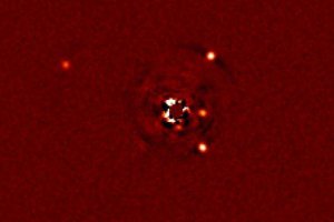 Астрономы получили фото планет ближайшего "двойника" Солнечной системы