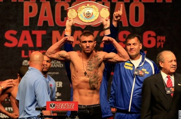 Василий Ломаченко владеет чемпионским поясом WBO