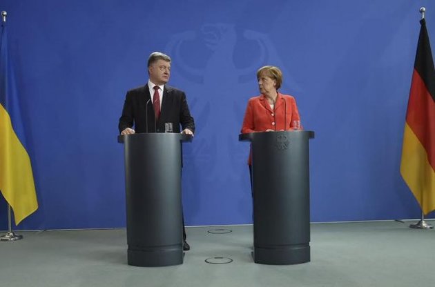 Меркель пообещала поддержку Украине "на пути к миру"