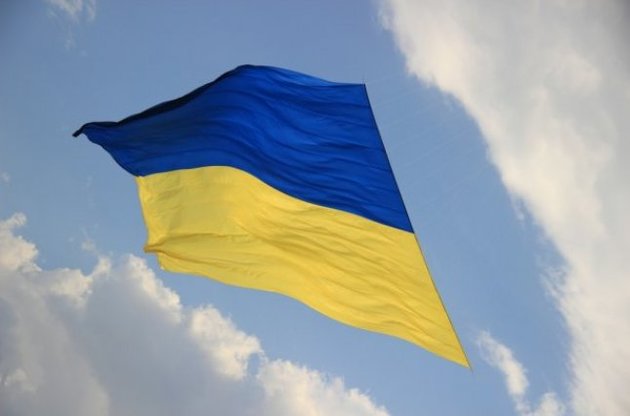 В Донецьку активісти спалили "прапор "ДНР" та встановили український стяг
