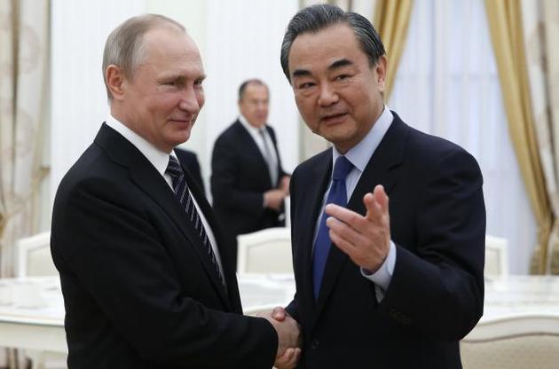 В.Путин и глава МИД Китая Ван И