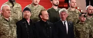 Боно, Эдж и Шон Пенн появились на красной дорожке Каннского фестиваля вместе с украинскими воинами