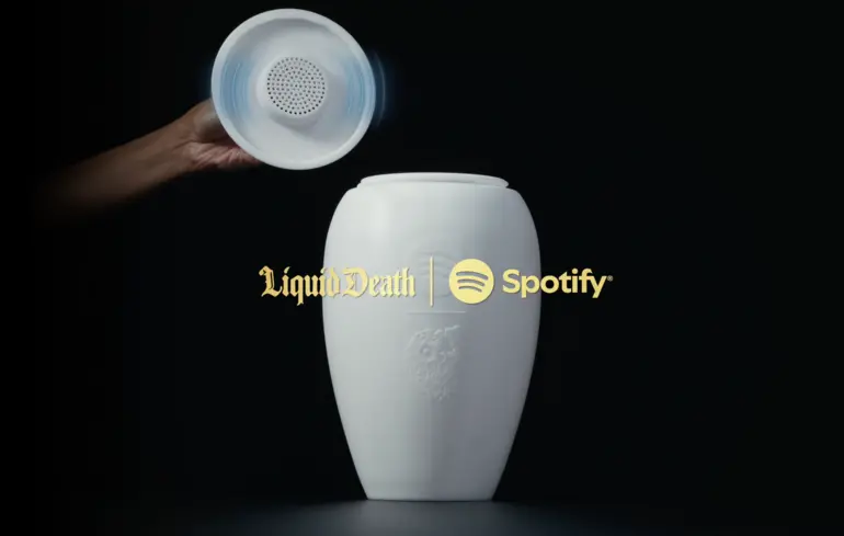 Колонка Spotify та Liquid Death у формі урни для кремації.