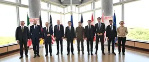 В Женеве протестующие против саммита G7 подожгли Tesla и разбили окна банка