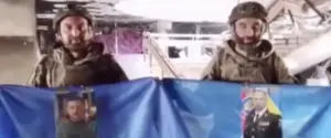 Держали на видео флаги с фото Зеленского и Сырского: в 