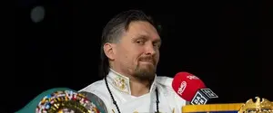 Российский боксер с пулеметом в руках вызвал на бой Усика и стал посмешищем