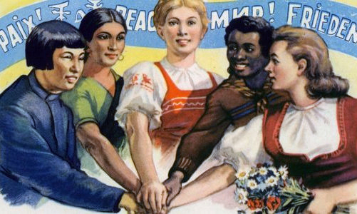 Плакат – «Жінки Комінтерну». Посередині – росіянка, її рука – над усіма. Плакат – «Жінки Комінтерну». Посередині – росіянка, її рука – над усіма.