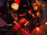Сотні людей у Львові запалили свічки