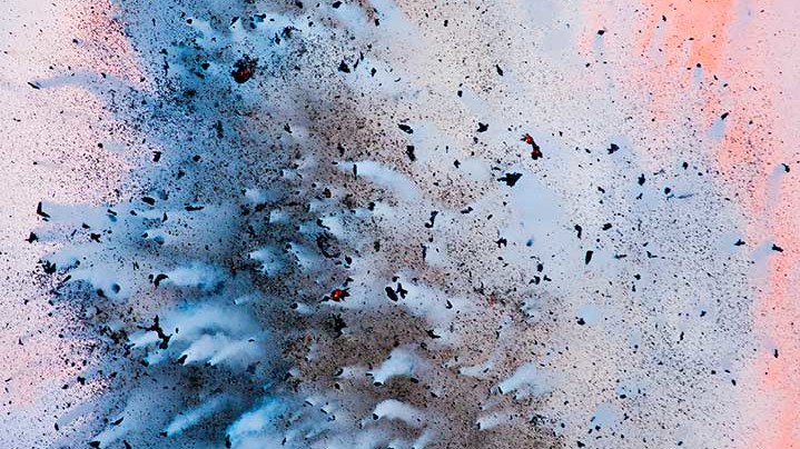 Особлива згадка журі. “On the Kīlauea Lava Flow in Kalapana, lava hits the ocean creating an explosion of molten basalt rocks and acidic steam plumes skyward. When lava hot vaporizes cool sea water it blasts lava rock fragments every direction and creates a billowing cloud of laze 'lava туман' made up of a mixture of acidic seawater steam, hydrochloric acid, and tiny shards of volcanic glass." Photo by Elyse Butler, Honolulu, Hawaii, USA.